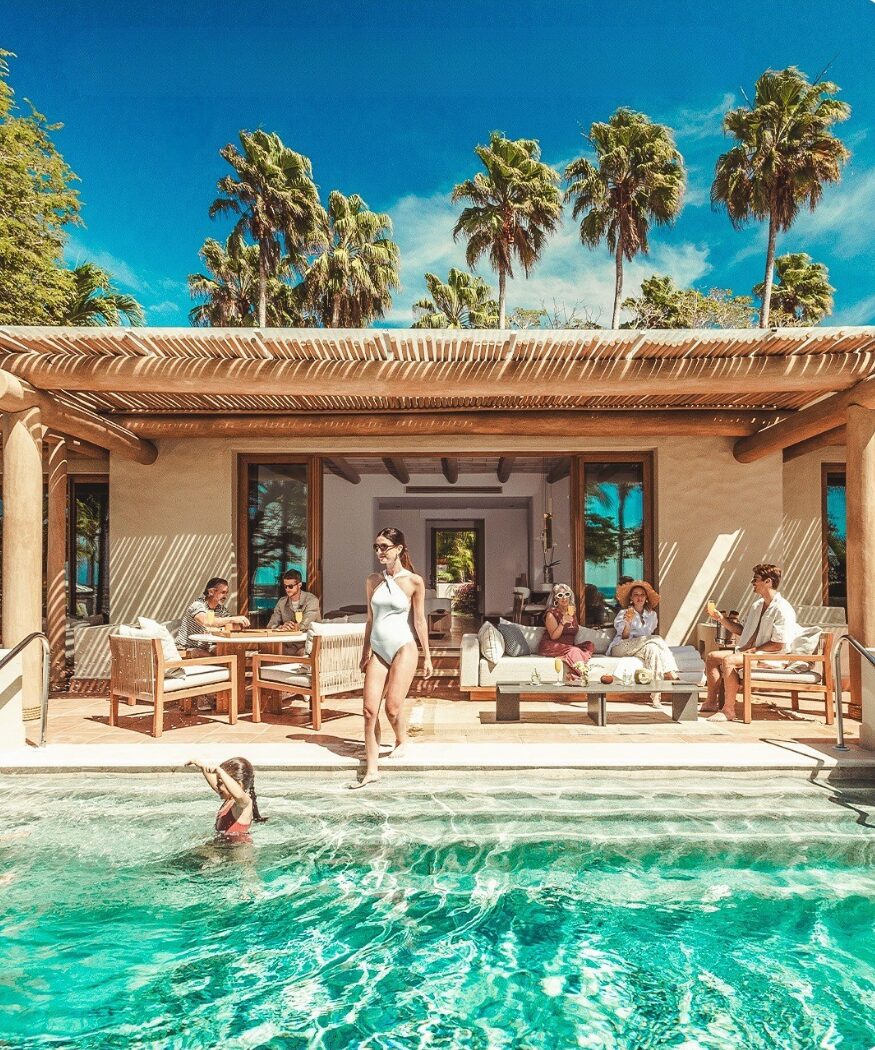 people enjoying on pool side