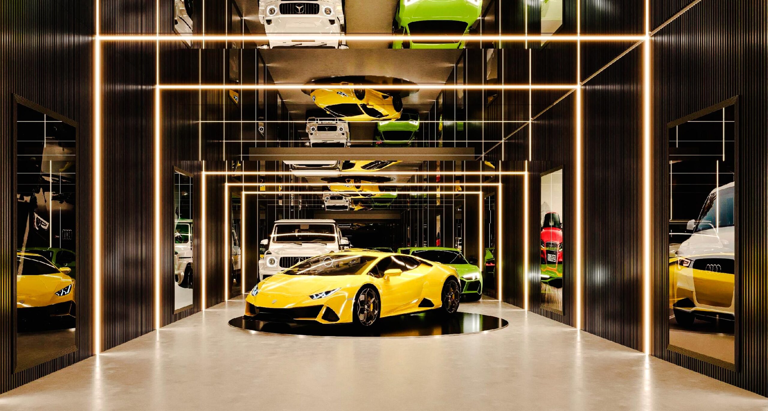 luxury cars in a room with mirrors