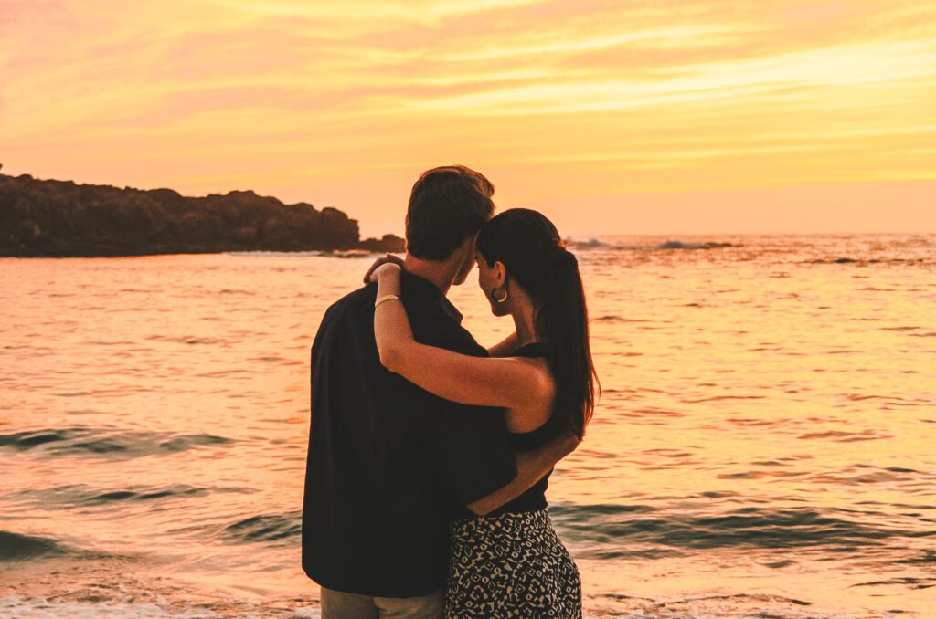a couple enjoying sunset view