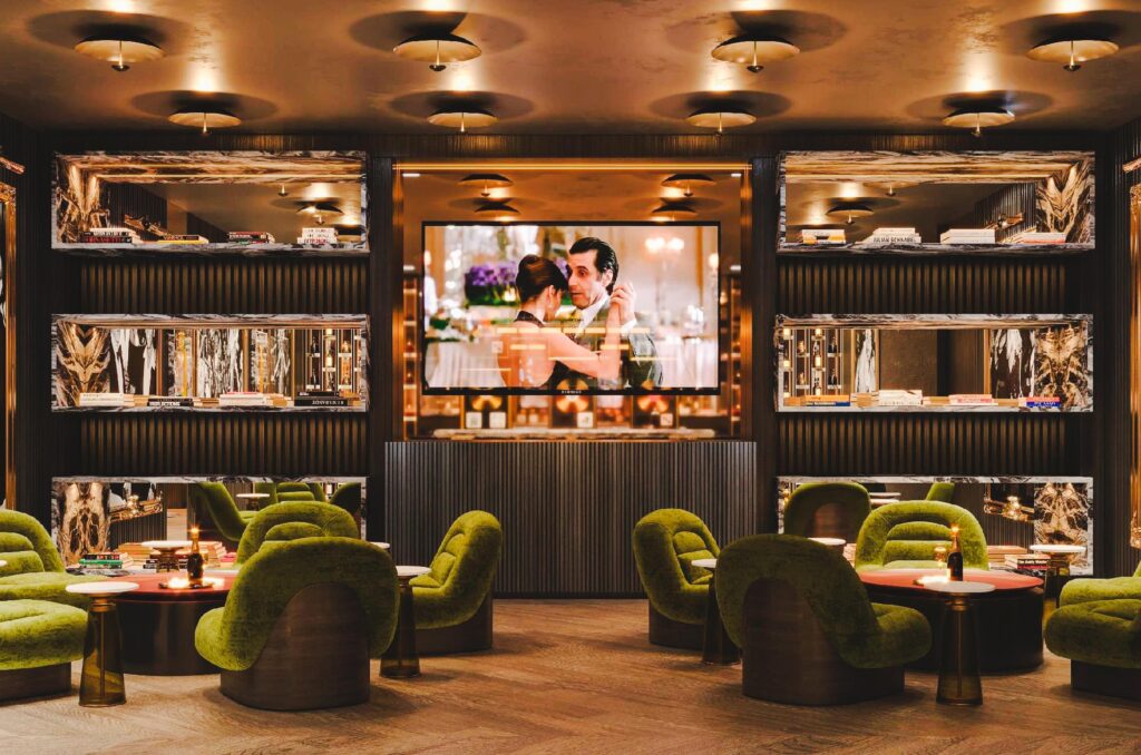 Beautiful bar with TV and sofas in it