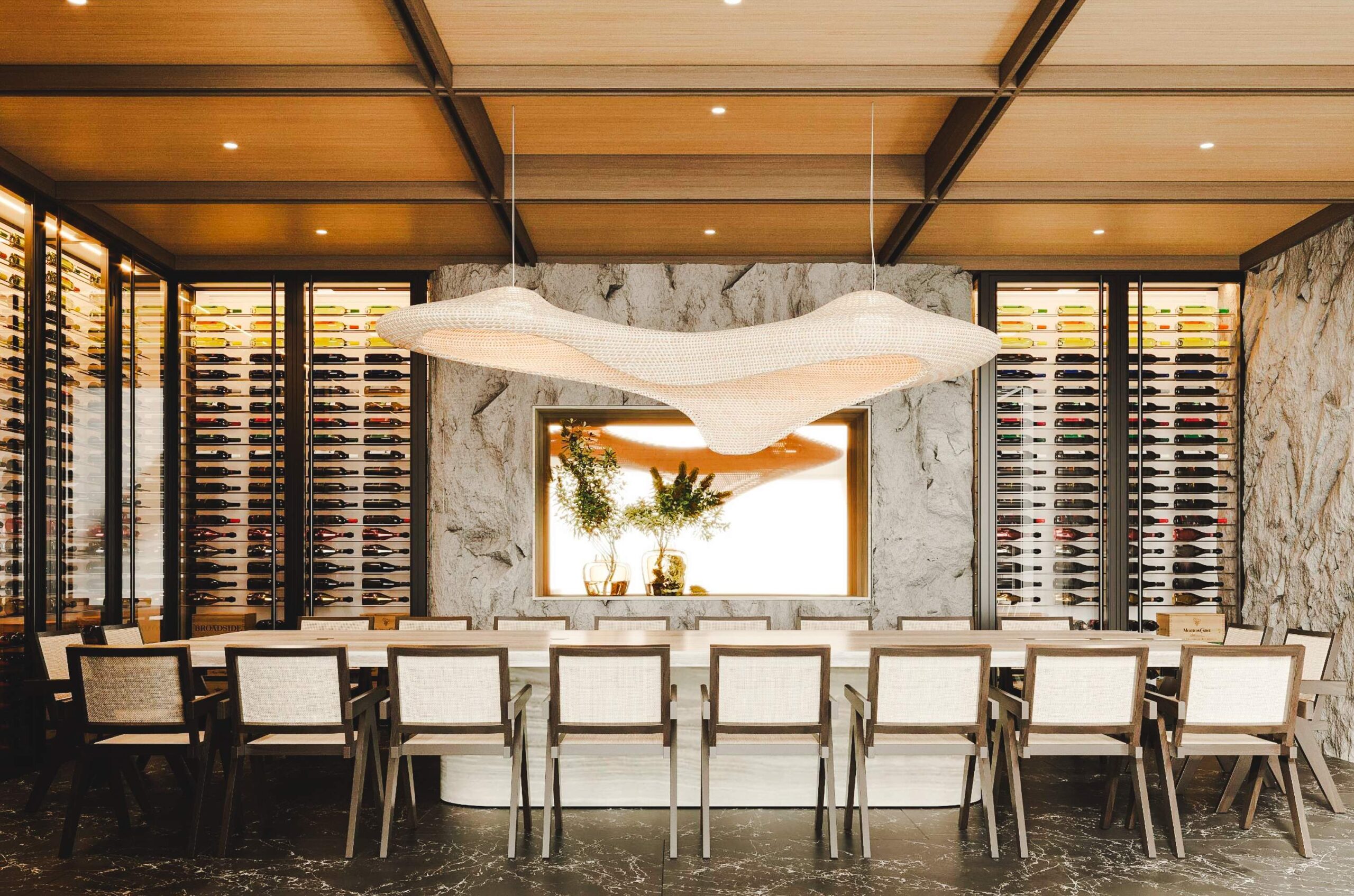 Dinning area with wine walls behind it